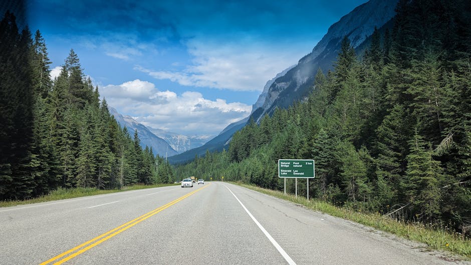 Picturesque highway scene with mountains and forest in British Columbia, Canada.